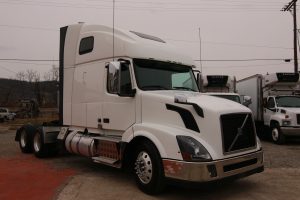 2012 Volvo VNL64T670 - Front Pass Side View