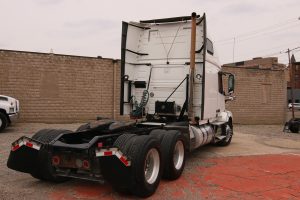 2012 Volvo VNL64T670 - Back View